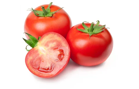 Whole and halved tomatoes